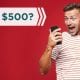 Want $500? with excited man looking at a phone