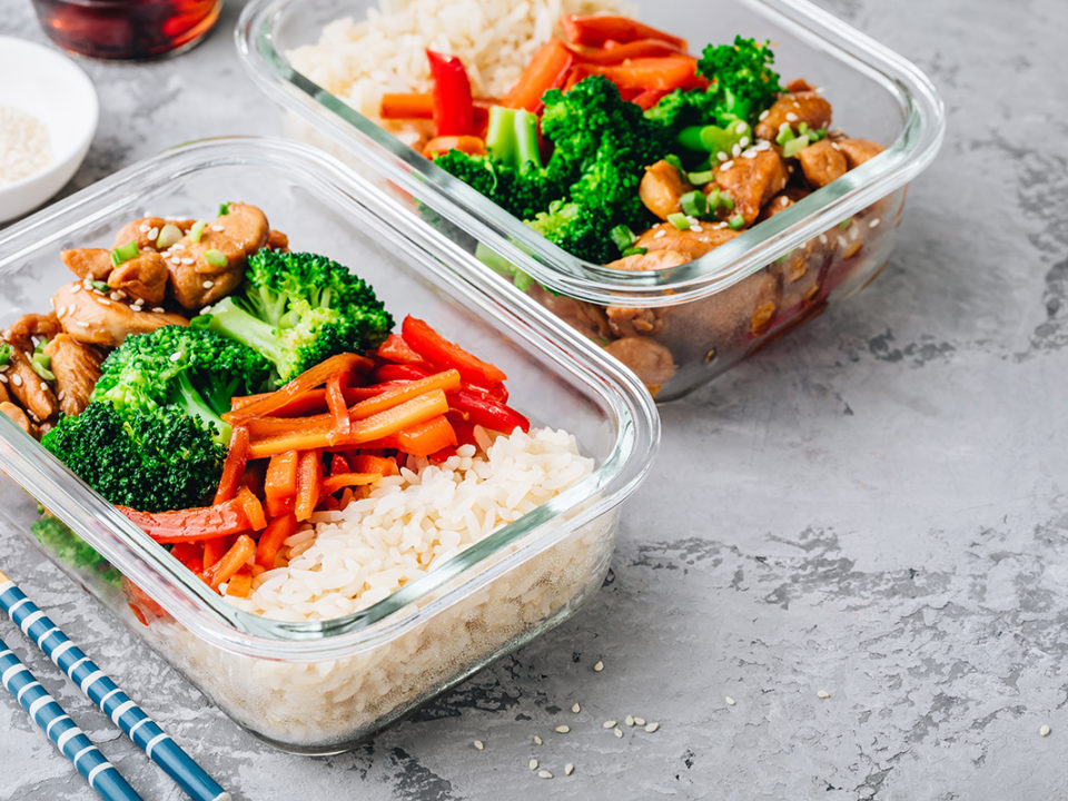 Chicken teriyaki stir fry meal prep lunch box containers with broccoli, rice and carrots