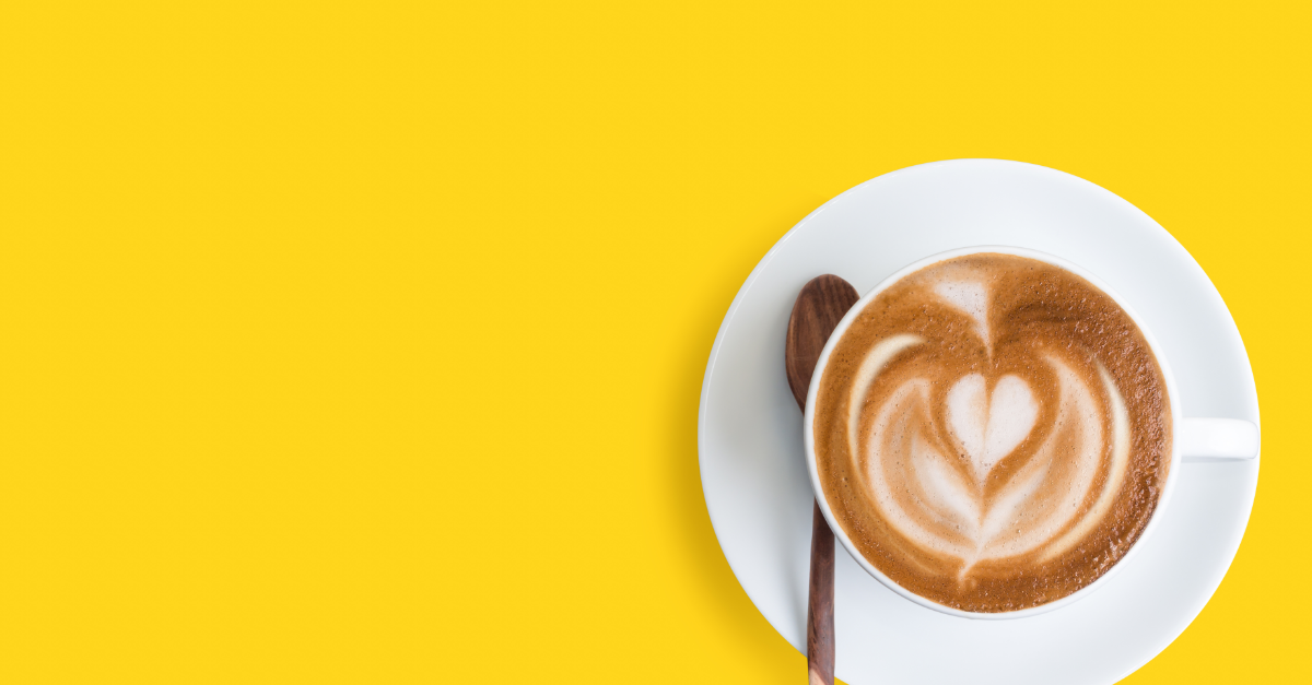 latte on a yellow backdrop