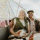 Cheerful senior couple enjoying a Ferris wheel by the Santa Monica pier