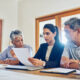 Shot of a mature couple getting advice from their financial consultant at home.