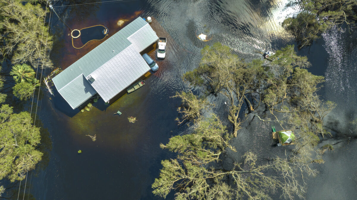 Flooded houses by hurricane Ian rainfall in Florida residential area. Consequences of natural disaster.